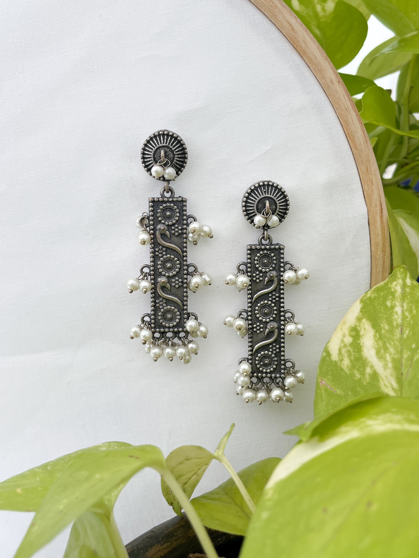 Noor - German Silver Rectangle Peacock Dangler Earrings