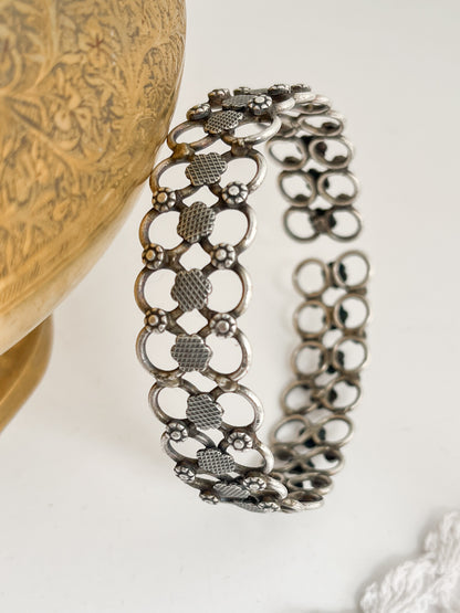 AROHI - Brass Light Weight Kada With Silver Plating Textured Flowers