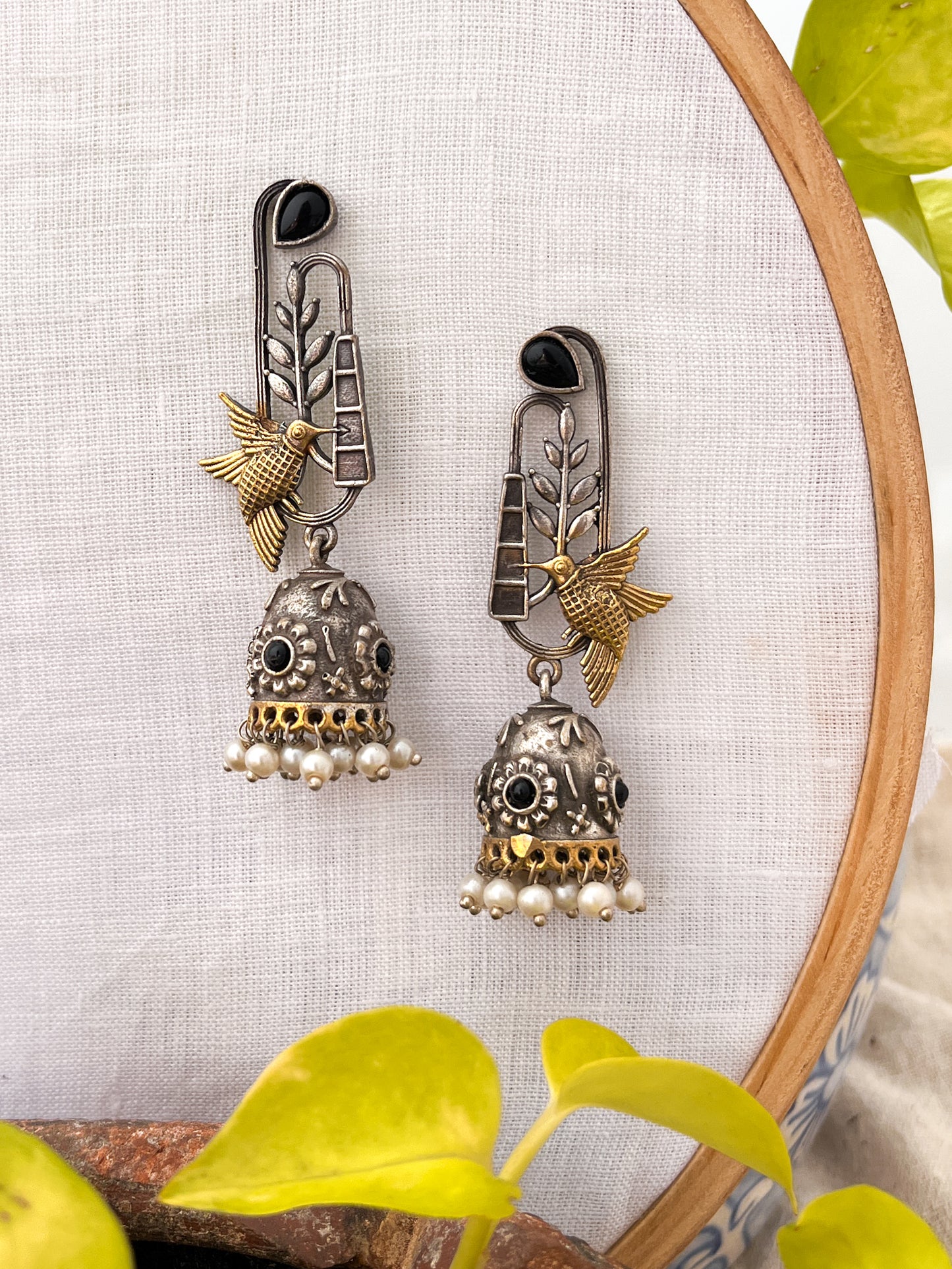 Pakhi- Dual Tone Bird Charm Oxidised Jhumka with Black Stones & Pearl Drops