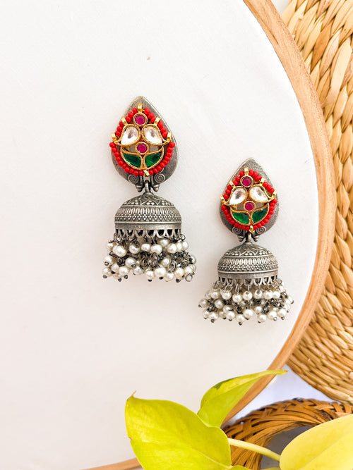 MENAKA - German Silver Jhumka With Panchi Kundan Work Red