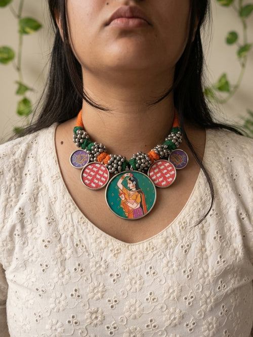 RANISA- Orange And Green Dhaaga German Silver Brass Neckpiece