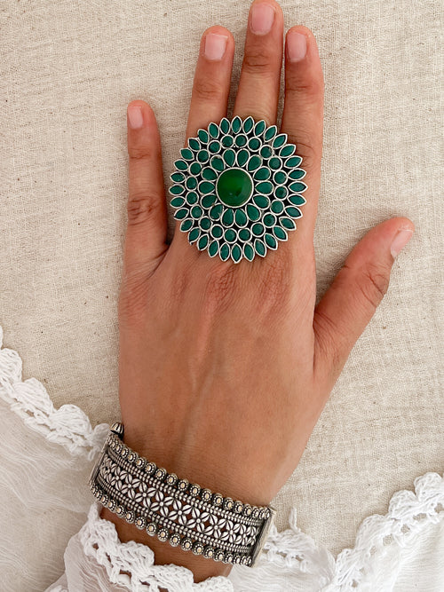Surya Phool Green Stone Silver Oxidised Ring